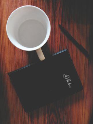 notebook,coffee,mug,pen
