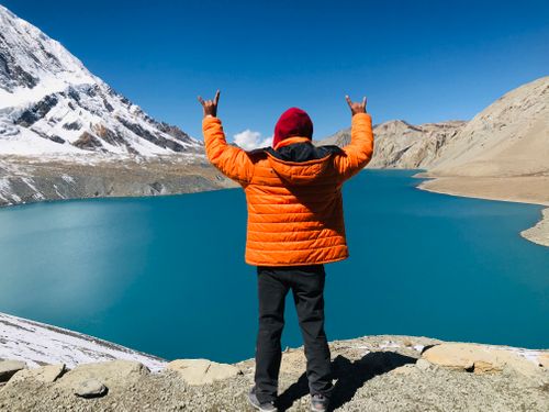 full,view,man,showing,rock,sign,highest,lake,world,tilicho
