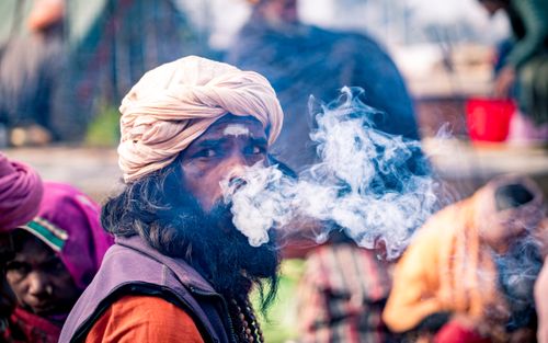 sadhu,man,smoking,mahashibratri,festival,pasupati,kathmandu,nepal