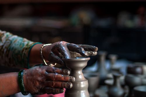 pala,palcha,small,bowl,shaped,clay,pot,light,oil,lamp,made,cotton,thread,process,making,bhakatapur,pottery,square,nepal