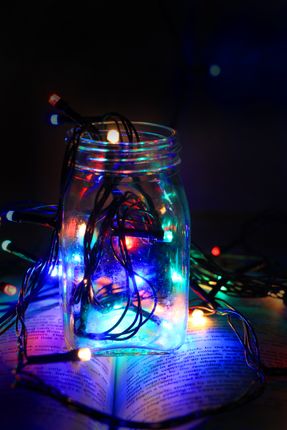 christmas,lights,glass,bottle,black,background