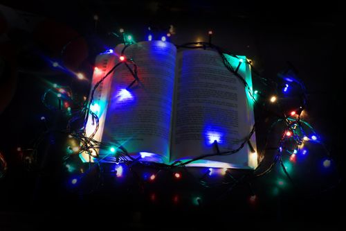 christmas,lights,book,black,background
