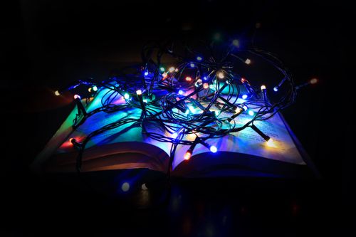 christmas,lights,book,black,background