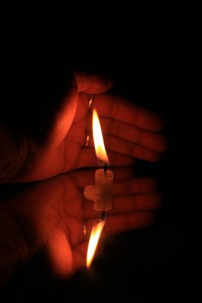 burning,candles,candle,female,hands,reflection#,stock,image,#nepal_photography#sitamayashrestha