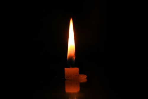small,burning,candles,reflection#,stock,image,#nepal_photography#sitamayashrestha