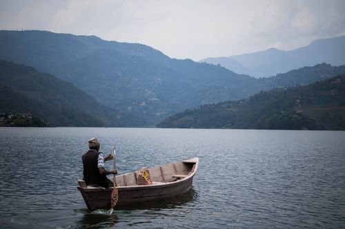 boatman,rowing,boat,begnas,lake