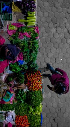 woman,selling,vegetables,night,baneshwor,area