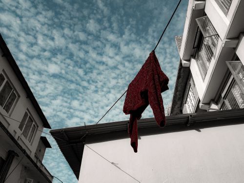 wet,red,sweater,hanging,sun,sunny,winter,day