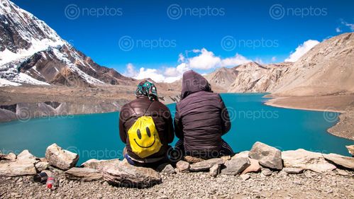 Find  the Image Just,Smile,,as,you,find,the,perfect,spot,to,share,your,company,-,Tilicho,Lake and other Royalty Free Stock Images of Nepal in the Neptos collection.