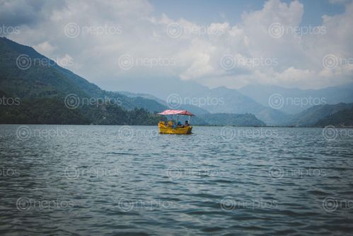 Find  the Image Couples,boating,on,a,lake and other Royalty Free Stock Images of Nepal in the Neptos collection.