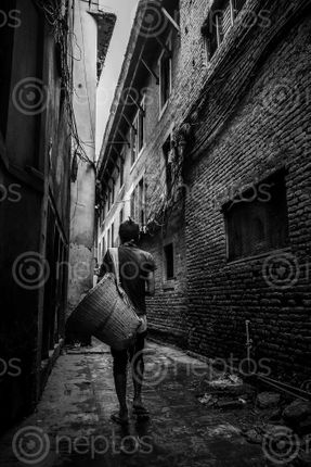 Find  the Image A,homeless,person,wandering,in,the,streets. and other Royalty Free Stock Images of Nepal in the Neptos collection.