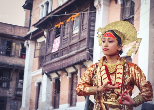 Find  the Image Newari,girl,dancing,wearing,a,traditional,Nepali,dress and other Royalty Free Stock Images of Nepal in the Neptos collection.