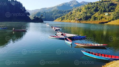 Find  the Image Boats,waiting,for,the,passangers,at,markhu,indrasharawor. and other Royalty Free Stock Images of Nepal in the Neptos collection.
