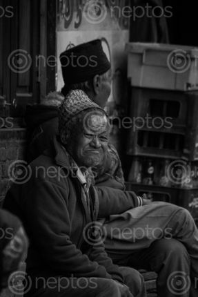 Find  the Image The,old,man,seating,front,of,tea,shop,to,talk,with,his,old,friends. and other Royalty Free Stock Images of Nepal in the Neptos collection.