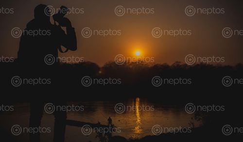 Find  the Image cameraman,capture,beautiful,sunset,fisherman,boat  and other Royalty Free Stock Images of Nepal in the Neptos collection.