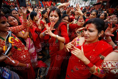 Find  the Image nepalese,women,sing,dance,celebrate,teej,festival,inside,pashupathinath,temple,premise,kathmandu,nepal,sunday,september,married,unmarried,fast,offering,worship,lord,shiva,marital,happiness,husband,praying,singing,dancing  and other Royalty Free Stock Images of Nepal in the Neptos collection.
