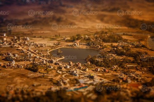 Find  the Image tauda,lake,bosan,dada,tilt,shift  and other Royalty Free Stock Images of Nepal in the Neptos collection.