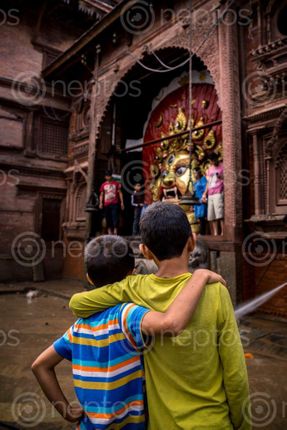 Find  the Image friendship,kids,watching,cleaning,process,swet,vairab,day,indrajatra  and other Royalty Free Stock Images of Nepal in the Neptos collection.
