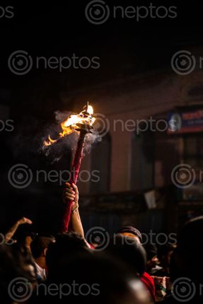 Find  the Image torch,god,man,carries,fire,guide,masked,dancers,crowd,indrajatra,nepals,biggest,street,festival  and other Royalty Free Stock Images of Nepal in the Neptos collection.