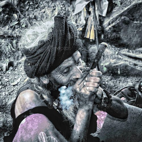 Find  the Image saint,enjoys,smoking,pipe,dakshinkali,temple  and other Royalty Free Stock Images of Nepal in the Neptos collection.