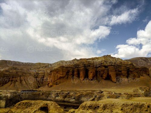 Find  the Image caves,lomanthang,upper,mustang  and other Royalty Free Stock Images of Nepal in the Neptos collection.