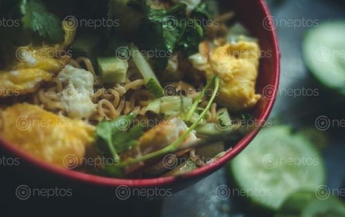 Find  the Image noodles,egg,vegetables  and other Royalty Free Stock Images of Nepal in the Neptos collection.
