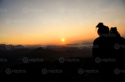 Find  the Image sarangkot,popular,tourist,destination,tourists,enjoy,great,view,pokhara,valley,magnificent,mountains,sunrise  and other Royalty Free Stock Images of Nepal in the Neptos collection.