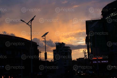 Find  the Image sunset,fiery,kiss,sun,sky,beautiful,city,painted,colours  and other Royalty Free Stock Images of Nepal in the Neptos collection.