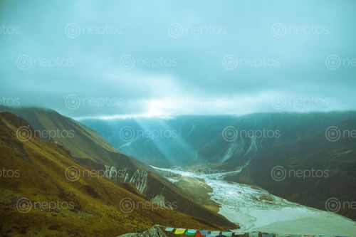 Find  the Image sun,rays,cloud  and other Royalty Free Stock Images of Nepal in the Neptos collection.