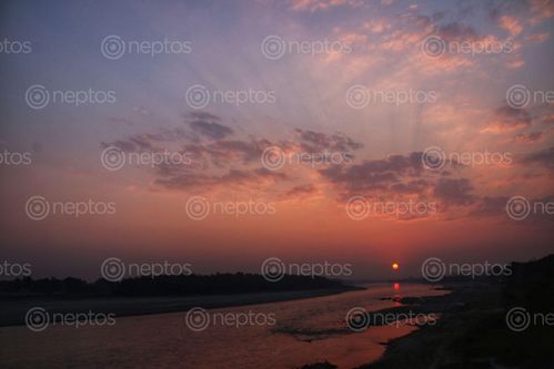 Find  the Image sunset,view,narayani,river  and other Royalty Free Stock Images of Nepal in the Neptos collection.
