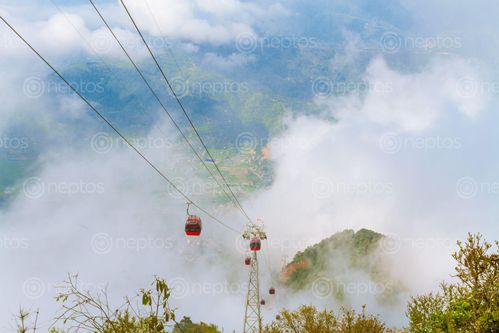 Find  the Image cable,cars,hill,anothers  and other Royalty Free Stock Images of Nepal in the Neptos collection.