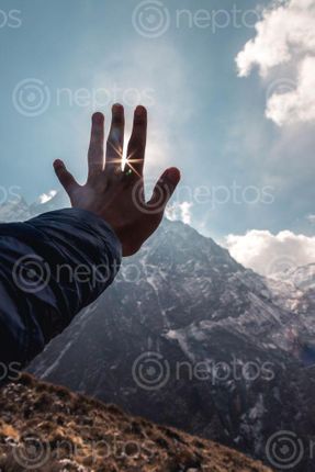 Find  the Image blocking,harsh,sun  and other Royalty Free Stock Images of Nepal in the Neptos collection.