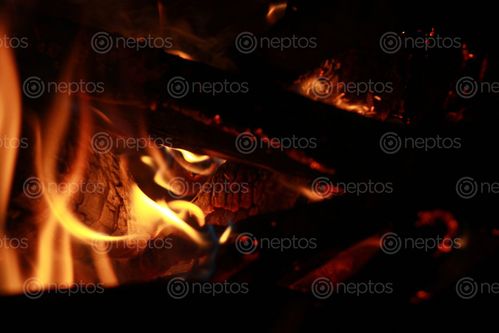 Find  the Image low,light,image,fire,coal  and other Royalty Free Stock Images of Nepal in the Neptos collection.