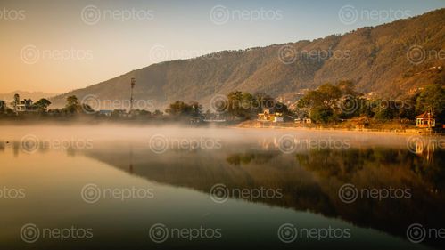 Find  the Image reflection,hattiban,hill,taudah,lake,kathmandu,nepal  and other Royalty Free Stock Images of Nepal in the Neptos collection.