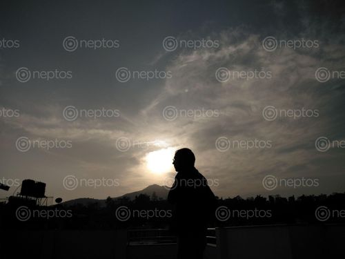 Find  the Image man,sunset  and other Royalty Free Stock Images of Nepal in the Neptos collection.