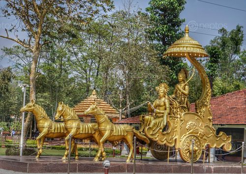 Find  the Image beautyful,golden,krishana,arjuna,guru,disciple,statue,shashwat,dham,cg,hindu,temple,located,devchuli,nawalparasi,distric  and other Royalty Free Stock Images of Nepal in the Neptos collection.