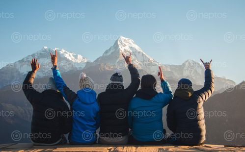 Find  the Image group,friends,enjoying,beautiful,view,mountains  and other Royalty Free Stock Images of Nepal in the Neptos collection.