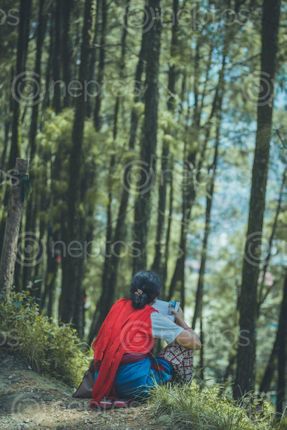 Find  the Image women,reading,books,woods  and other Royalty Free Stock Images of Nepal in the Neptos collection.