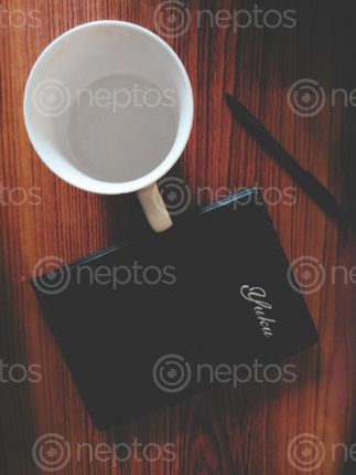 Find  the Image notebook,coffee,mug,pen  and other Royalty Free Stock Images of Nepal in the Neptos collection.