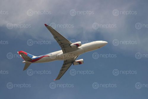 Find  the Image aeroplane,sky,kathmandu  and other Royalty Free Stock Images of Nepal in the Neptos collection.