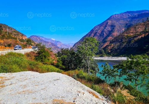 Find  the Image beautiful,scenery,sindhupalchowk,koshi,flowing  and other Royalty Free Stock Images of Nepal in the Neptos collection.