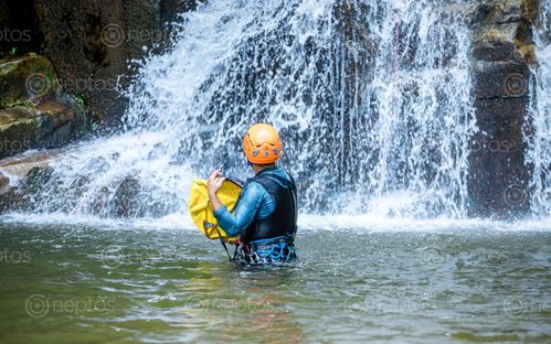 Find  the Image playing,adventure,canyoning,waterfall,lamjung,nepal  and other Royalty Free Stock Images of Nepal in the Neptos collection.