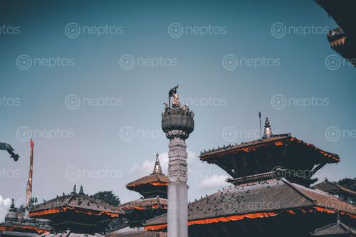 Find  the Image picture,basantapur,durbar,square,statue,person,top,pillar,king,pratap,malla  and other Royalty Free Stock Images of Nepal in the Neptos collection.