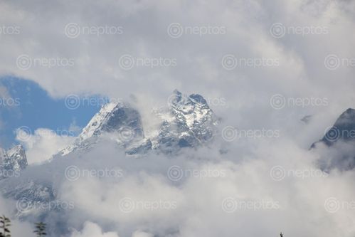 Find  the Image himlayan,tilicho,lake,npal,clouds,fading,mountain  and other Royalty Free Stock Images of Nepal in the Neptos collection.