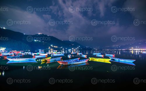 Find  the Image evening,view,parking,boats,lake,pokhara,nepal  and other Royalty Free Stock Images of Nepal in the Neptos collection.