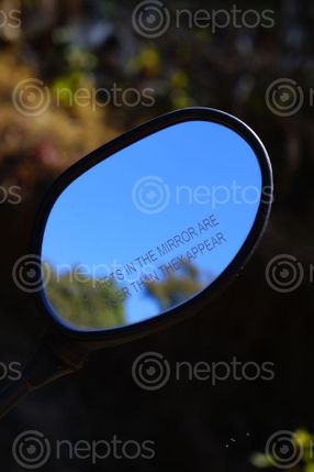 Find  the Image picture,mirror,bike,clicked,bhaktapurnepal,1st,magh  and other Royalty Free Stock Images of Nepal in the Neptos collection.