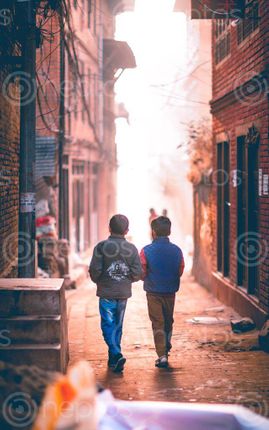 Find  the Image boys,roaming,streets,bhaktapur  and other Royalty Free Stock Images of Nepal in the Neptos collection.