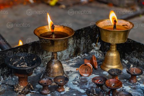 Find  the Image prayer,candlediyo,lit,temple,stupas,churches  and other Royalty Free Stock Images of Nepal in the Neptos collection.