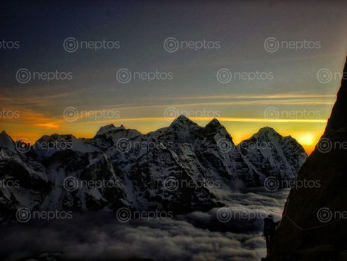Find  the Image climber,climbs,back,tent,craziest,campcamp,amadablam,khumbu,region  and other Royalty Free Stock Images of Nepal in the Neptos collection.