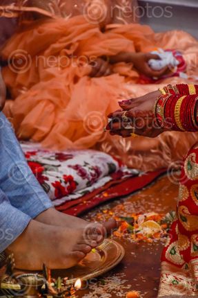 Find  the Image bride,worshiping,groom  and other Royalty Free Stock Images of Nepal in the Neptos collection.